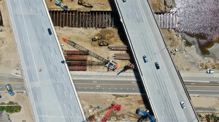 aerial-view-highway-bridge-construction-small-river-san-diego-california-usa.webp