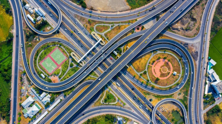 aerial-view-traffic-massive-highway-intersection.webp