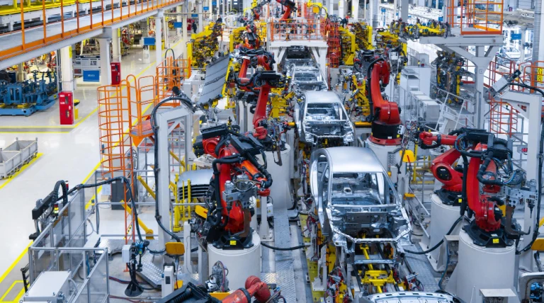 assembly-line-production-new-car-automated-welding-car-body-production-line-robotic-arm-car-production-line-is-working.webp