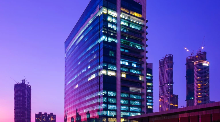 glassclad-skyscrapers-central-mumbai-reflecting-sunset-hues-blue-hour-ww8mx-aux07.webp